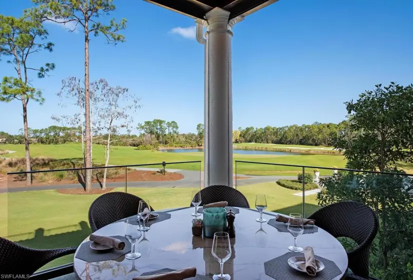 View of patio / terrace with a water view