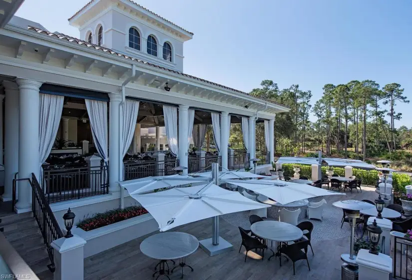 View of patio with a deck