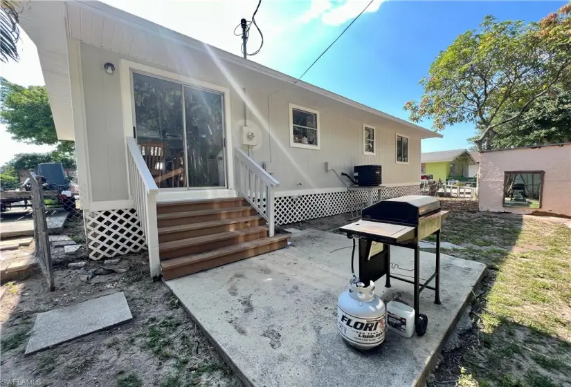 Back of property featuring a patio